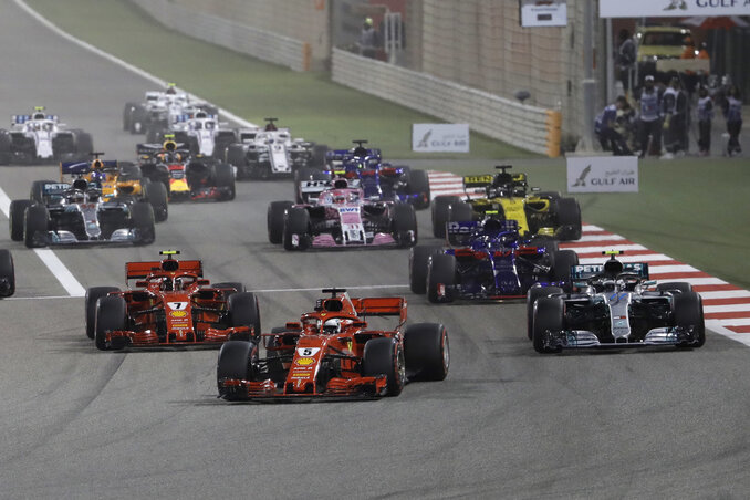 Vettel rajt-cél győzelmet aratott (Fotó: MTI/AP)