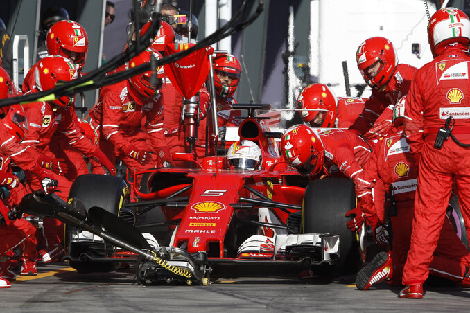 Vettel a kerékcserés taktikájával nyerte meg a futamot