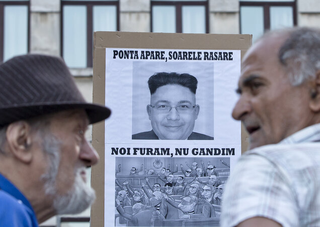 Victor Pontát Kim Jong-un-ként ábrázoló plakát (Fotó: Beta/AP) Victor Pontát Kim Jong-un-ként ábrázoló plakát (Fotó: Beta/AP)
