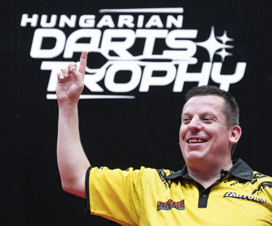 Dave Chisnall győzelmet ünnepelhetett (Fotó: MTI) Dave Chisnall győzelmet ünnepelhetett (Fotó: MTI)