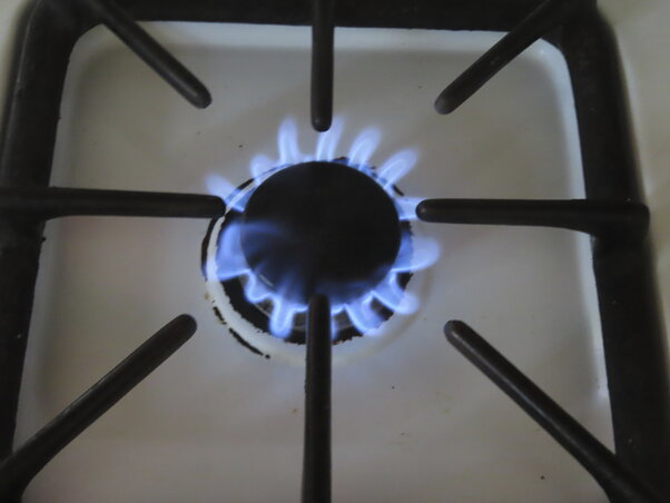 Natural gas burns on a kitchen stove in Atlantic City N.J., Thursday, July 26, 2023. Government pushes to move buildings and vehicles away from burning fossil fuels to help address climate c Natural gas burns on a kitchen stove in Atlantic City N.J., Thursday, July 26, 2023. Government pushes to move buildings and vehicles away from burning fossil fuels to help address climate c