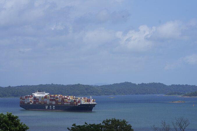A cargo ship waits on Gatun lake, for its transit through the Agua Clara locks of the Panama Canal in Agua Clara, Panama, Thursday, Aug. 3, 2023. The Panama Canal Authority said it is limiti A cargo ship waits on Gatun lake, for its transit through the Agua Clara locks of the Panama Canal in Agua Clara, Panama, Thursday, Aug. 3, 2023. The Panama Canal Authority said it is limiti