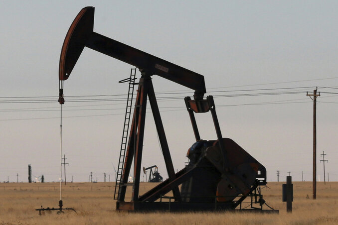 FILE - A pumpjack as seen on Wednesday, March 30, 2022, in Tatum, New Mexico. President Joe Biden is promising “strong executive action” to combat climate change, despite dual setbacks that FILE - A pumpjack as seen on Wednesday, March 30, 2022, in Tatum, New Mexico. President Joe Biden is promising “strong executive action” to combat climate change, despite dual setbacks that