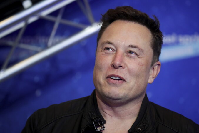 FILE - Tesla and SpaceX CEO Elon Musk arrives on the red carpet for the Axel Springer media award in Berlin on Dec. 1, 2020. Musk says he plays on remaining as Twitter’s CEO until he can fin FILE - Tesla and SpaceX CEO Elon Musk arrives on the red carpet for the Axel Springer media award in Berlin on Dec. 1, 2020. Musk says he plays on remaining as Twitter’s CEO until he can fin