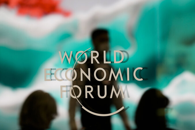The logo of the World Economic Forum displayed on a window during the Annual Meeting of the Forum in Davos, Switzerland Tuesday, Jan. 17, 2023. The annual meeting of the World Economic Forum The logo of the World Economic Forum displayed on a window during the Annual Meeting of the Forum in Davos, Switzerland Tuesday, Jan. 17, 2023. The annual meeting of the World Economic Forum