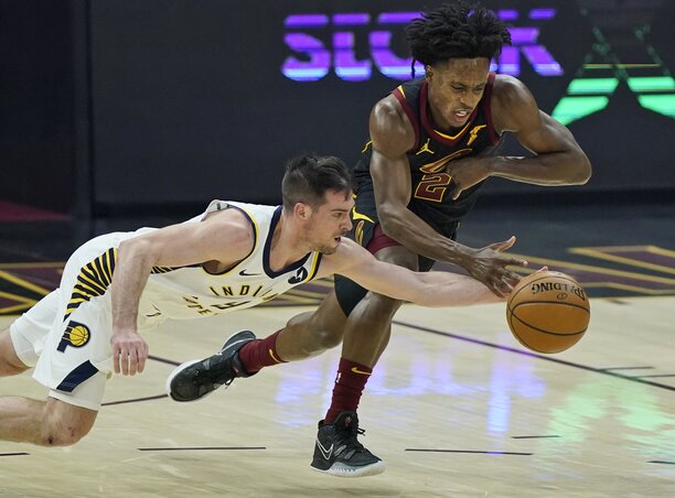 McConnell (balról) az első félidőben kilencszer lopta el a labdát, ami új NBA-rekord (Fotó: Beta/AP)