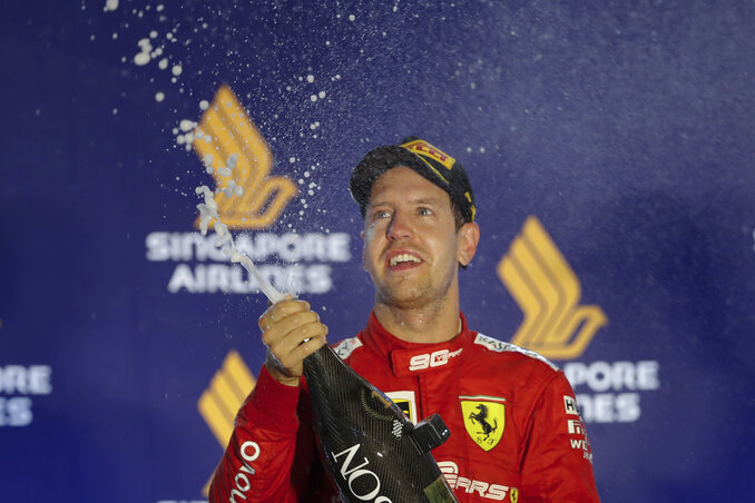 Vettel végre önfeledten pezsgőzhetett (Fotó: Beta/AP)