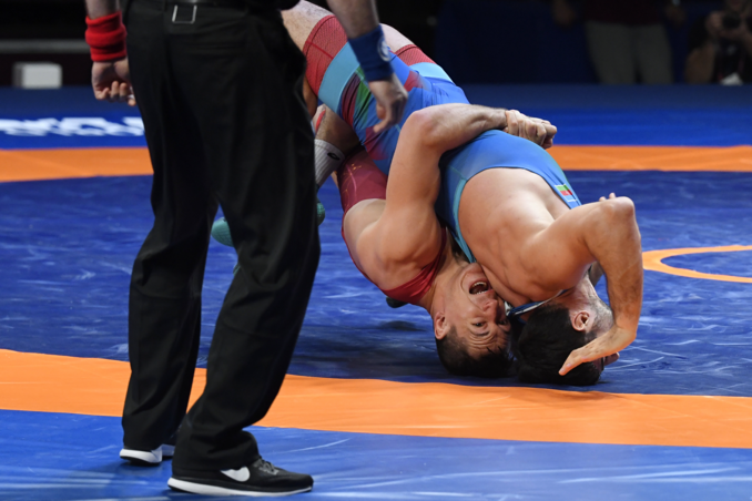 Lőrincz Viktor (piros) és azeri Iszlam Abbaszov a férfi kötöttfogású birkózók 87 kilogrammos súlycsoportjának elődöntőjében a római birkózó Európa-bajnokságon (Fotó: MTI) Lőrincz Viktor (piros) és azeri Iszlam Abbaszov a férfi kötöttfogású birkózók 87 kilogrammos súlycsoportjának elődöntőjében a római birkózó Európa-bajnokságon (Fotó: MTI)